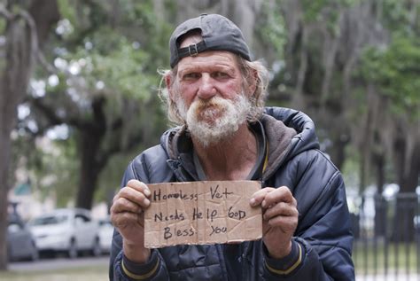 Homeless Man Holding Sign Real Estate Weekly