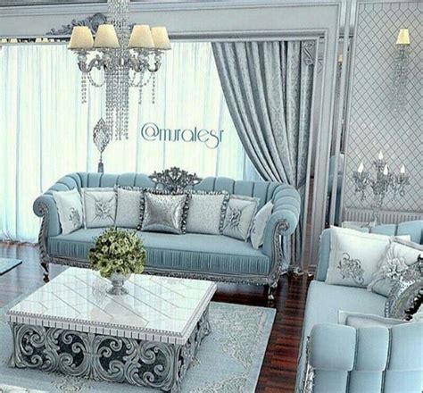 Silver living room cool with a dash of pretty, this urban room by wendy labrum proves that bold living room colours can be serene too. Blue silver | Luxury sofa design, Sofa design, Living room furniture
