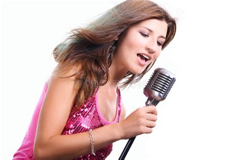 Beautiful Girl With A Microphone Singing A Song Royalty