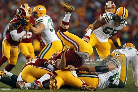 Jeff Janis Of The Green Bay Packers Is Tackled By Tanard Jackson Of