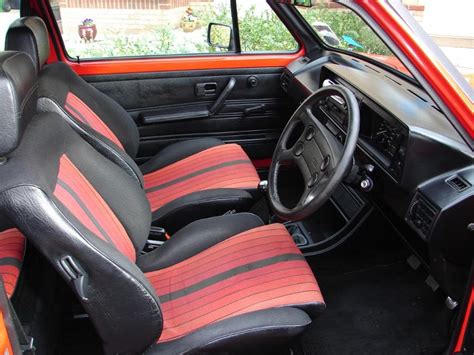The volkswagen golf (listen ) is a compact car produced by the german automotive manufacturer volkswagen since 1974, marketed worldwide across eight generations. Interior Features - Volkswagen Golf GTI MK1 Campaign ...