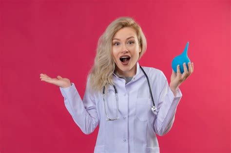 Free Photo Surprised Doctor Young Girl Wearing Stethoscope In Medical