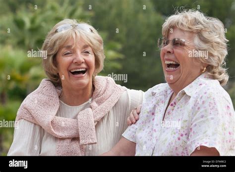 Elderly Women Laughing Together Stock Photo Alamy