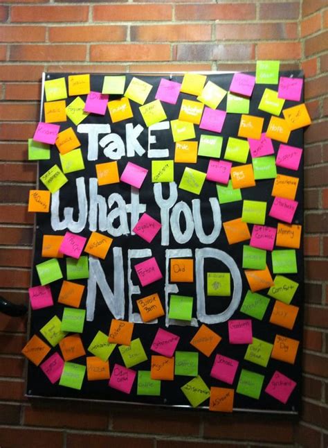 A Take What You Need Board Each Post It Has Something Written On It