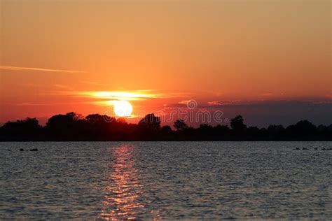 Colorful Sunset Over Water Stock Image Image Of Forest 97774255