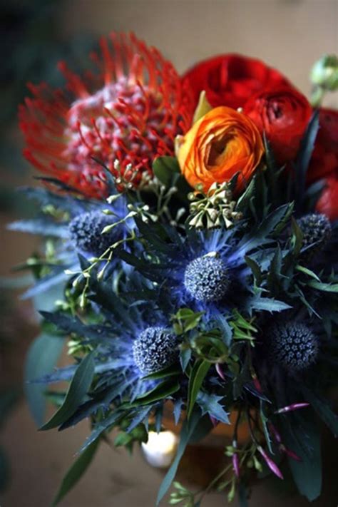 Looking for orange artificial wedding flowers? Colour Scheme…. Blue & Orange | Orange wedding flowers ...