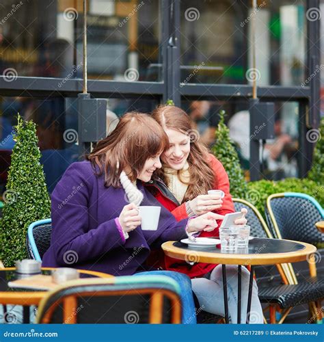 two girls in parisian street cafe stock image image of mobile parisian 62217289