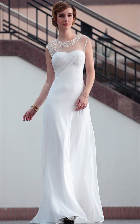 See 2021's latest wedding dress trends & newest bridal gown designs! White Lace Wedding Dress With Beading By Elliot Claire London | notonthehighstreet.com