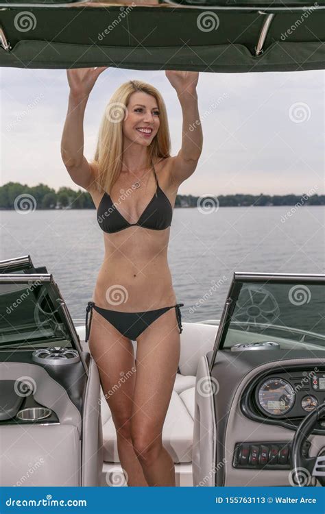 Beautiful Bikini Model Relaxing On A Boat By The Docks Stock Image Image Of Health Model