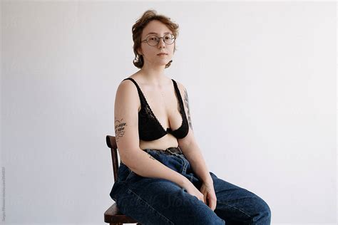 Chubby Woman In Glasses Looking At Camera By Sergey Filimonov