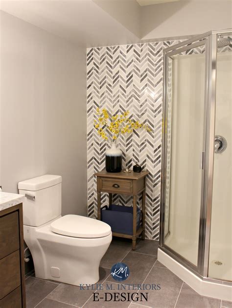 Herringbone Or Chevron Gray Marble Accent Tile In Small Bathroom With