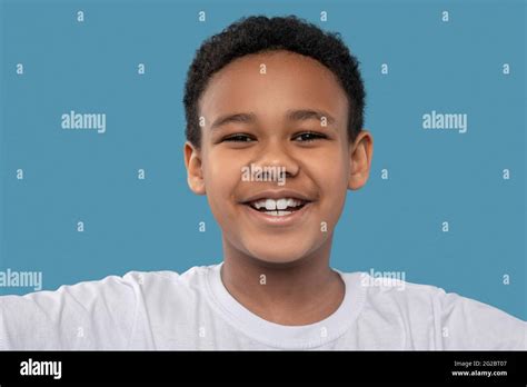 Joyful African American Boy With Toothy Smile Stock Photo Alamy
