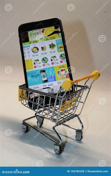 The Cell Phone Is In A Shopping Cart Editorial Stock Photo Image Of