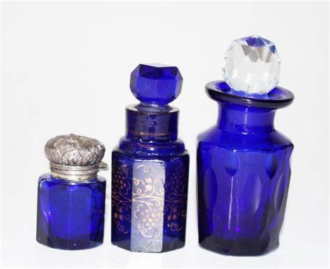 Vintage Blue Glass Perfume Bottles With Silver Tops Scent Bottles Costume And Dressing Accessories