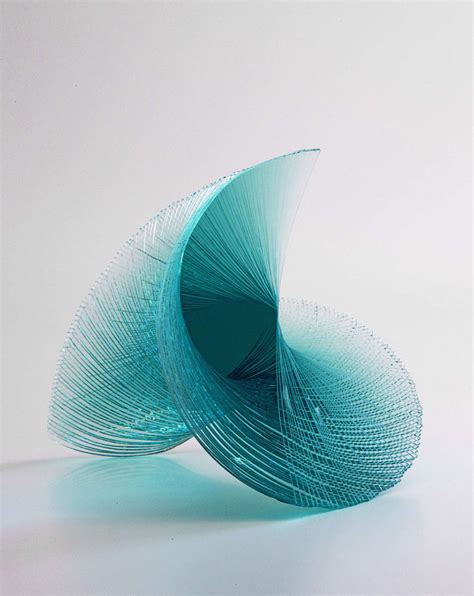 Artist Niyoko Ikuta Uses Layers Of Laminated Sheet Glass To Create Spiraling Geometric