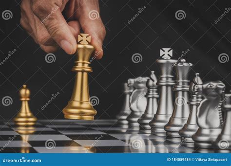 Silver Chess Pieces King And Queen Isolated On Black Background Royalty