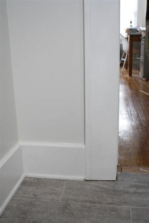 Baseboard Over Sized Tute And Door Trim Meets Floor Trim Baseboard
