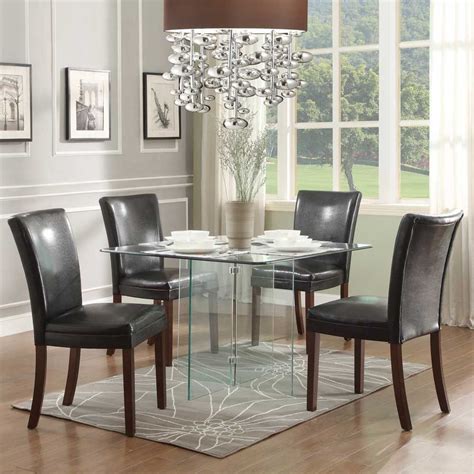 It's sleek and elegant and the extensions work in a very clever way. Elegant Glass Dining Table - Wiki Homes