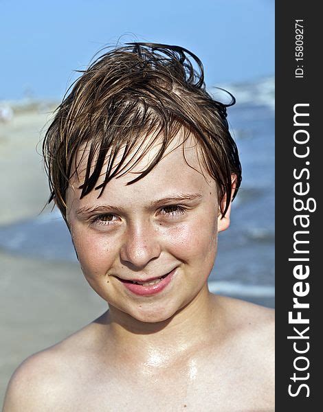 Happy Boy With Wet Hair At The Beach Free Stock Images And Photos