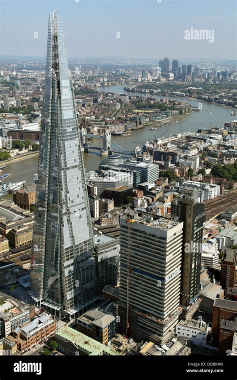 Aerial View Of The Shard Tower Bridge River Thames And Canary Wharf