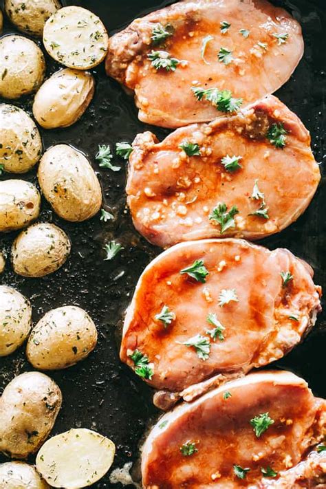These delicious pork chops are browned in butter then simmered in a homemade country gravy until done. Easy Baked Pork Chops Recipe | Sheet Pan Pork Chops + Baby ...