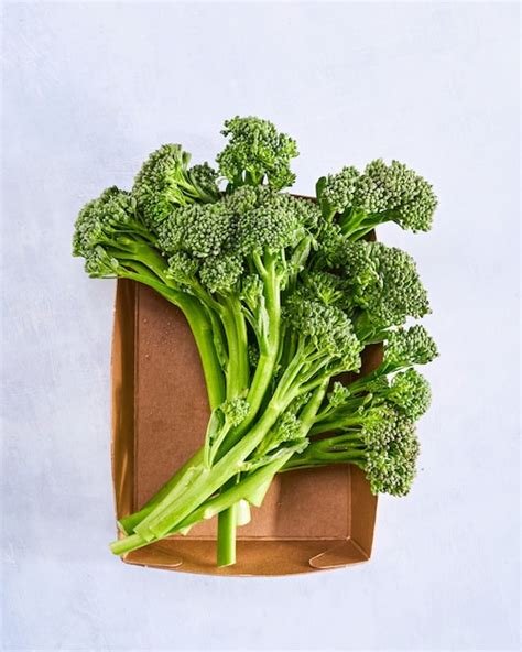 Premium Photo Raw Broccolini Fresh Organic Broccoli Florets Green