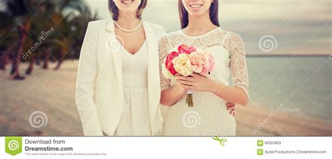 close up of happy lesbian couple with flowers stock image image of couple background 66353925