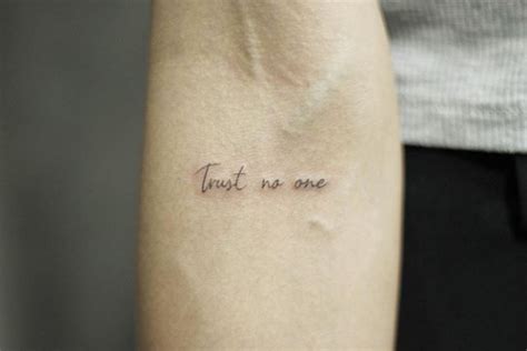 What does trust no one tattoo mean? 65 Subtle Tattoo Designs All Introverts Will Appreciate ...