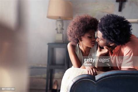 Interracial Couple Kissing In Bed Stock Fotos Und Bilder Getty Images