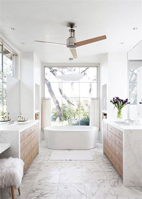 See how top designers create both timeless and trendy looks with marble, cement, ceramic, porcelain, faux wood and glass tile. 29 white marble bathroom floor tile ideas and pictures 2020