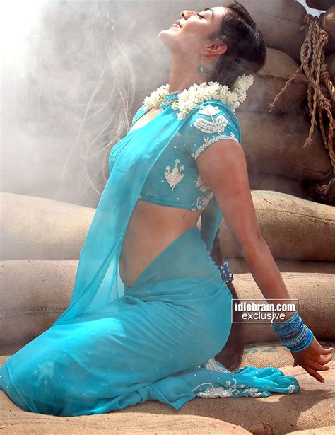 Kajal Agarwal Hot Blue Saree Stills Showing Her Navel Bollymira