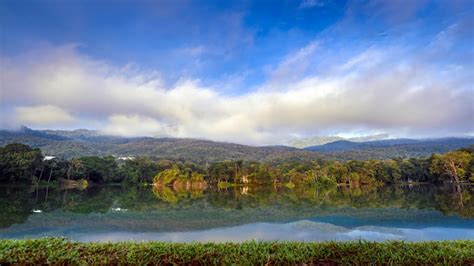 Premium Photo Ang Kaew Lake Landscape With Mountains Background In