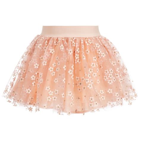A Gorgeous Pink Tulle Skirt By Mayoral With A Pale Pink Daisy Print And Gold Dots It Has A
