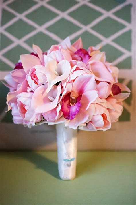 We did not find results for: Pink tropical flowers in a bride's wedding bouquet ...