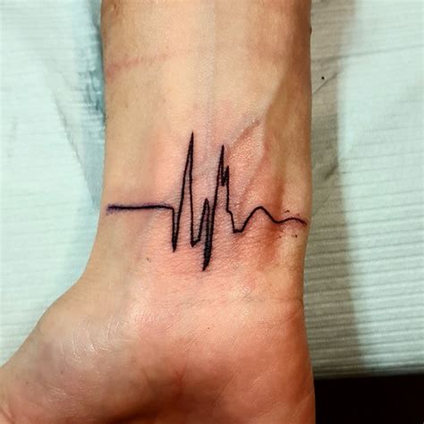 30 heartbeat tattoo designs and meanings feel your own rhythm