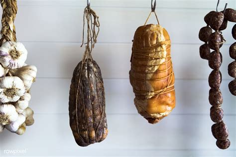 Download Premium Photo Of Cured Meat Hanging In A Deli Shop 485686