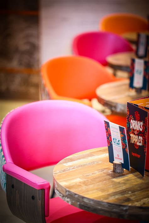 Vibrant And Colourful Orange And Pink Fuschia Tub Chairs Rustic
