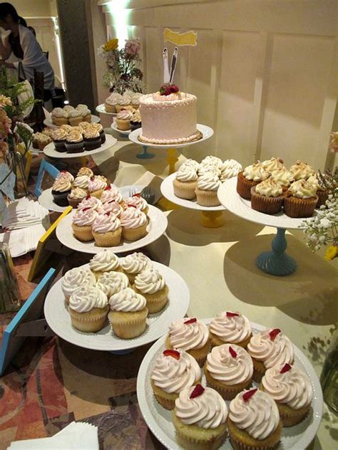 There are tons of ways to. Wedding Cupcake Display | Wedding cakes with cupcakes ...