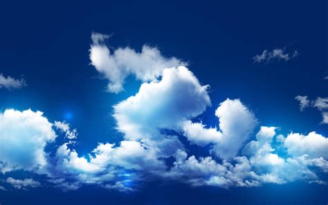 Fluffy Clouds On A Beautiful Blue Sky Hd Wallpaper