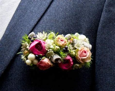 A large choice of floral pocket squares is available on the house of ties. Boutonnieres - Boutonniere Pocket Square #2054170 - Weddbook