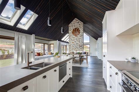 This architecturally designed, generously proportioned pavilion style home features 3 bedrooms, an office and kitchen with scullery, complete with north west facing outdoor open plan living/entertainment area. David Reid Homes Queenstown Showhome | Hanley Farm