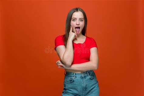 Cheeky Modern Young Girl Showing Tongue Teasing Making Faces Fooling