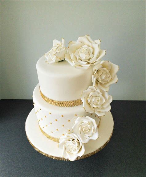 Two Tier White And Gold Wedding Cake