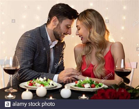 Download This Stock Image Couple In Love Celebrating Valentines Day In Restaurant Having