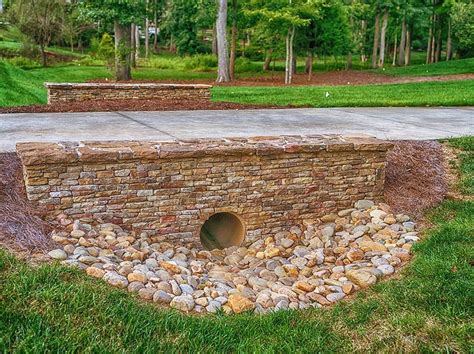 If there's a ditch or other similar sort of undulation in the land where you're planning to build your driveway, you'll need to look. Pin by Chris on Culvert | Driveway entrance landscaping ...