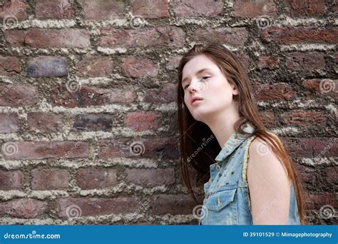 Woman Leaning Against Brick Wall Stock Image Image Of Adult People