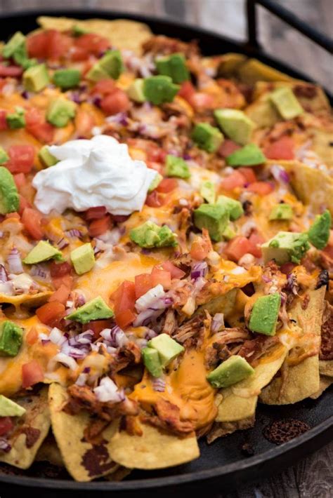 Loaded Campfire Nachos With Shredded Chicken And Hummus Are A Cheesy