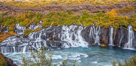 Panoramic View Of The Hraunfossar Waterfall In Early Autumniceland