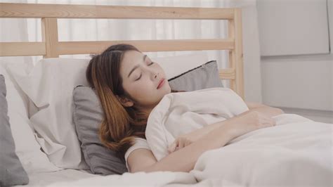Free Photo Asian Woman Dreaming While Sleeping On Bed In Bedroom