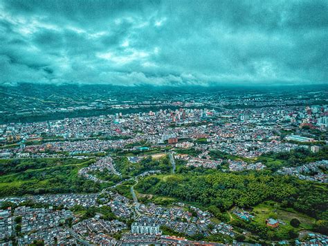 Aerial View Of City Under Cloudy Sky During Daytime Hd Wallpaper Peakpx
